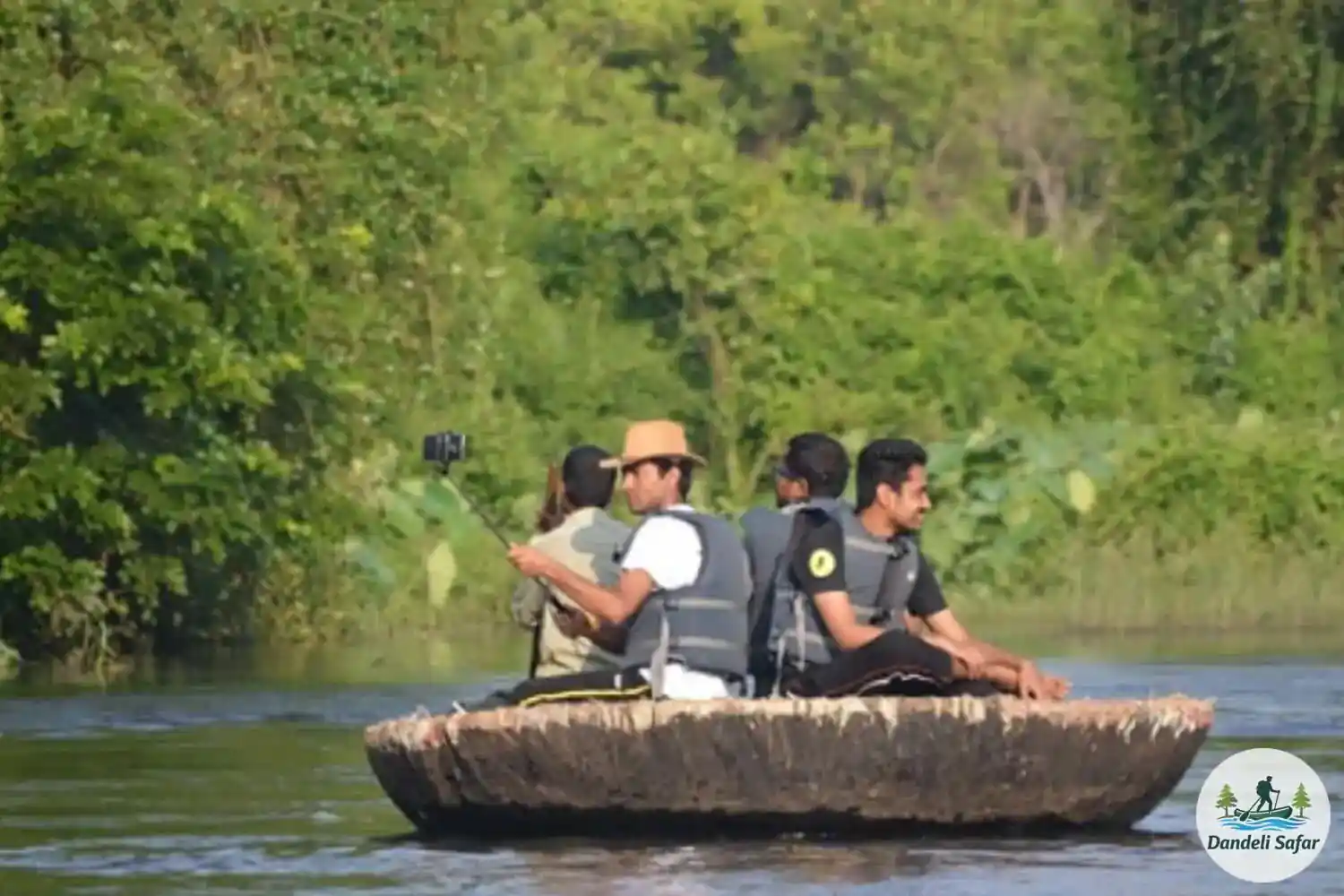 Traditional coracle ride on Kali River backwaters, popular Dandeli water activity
