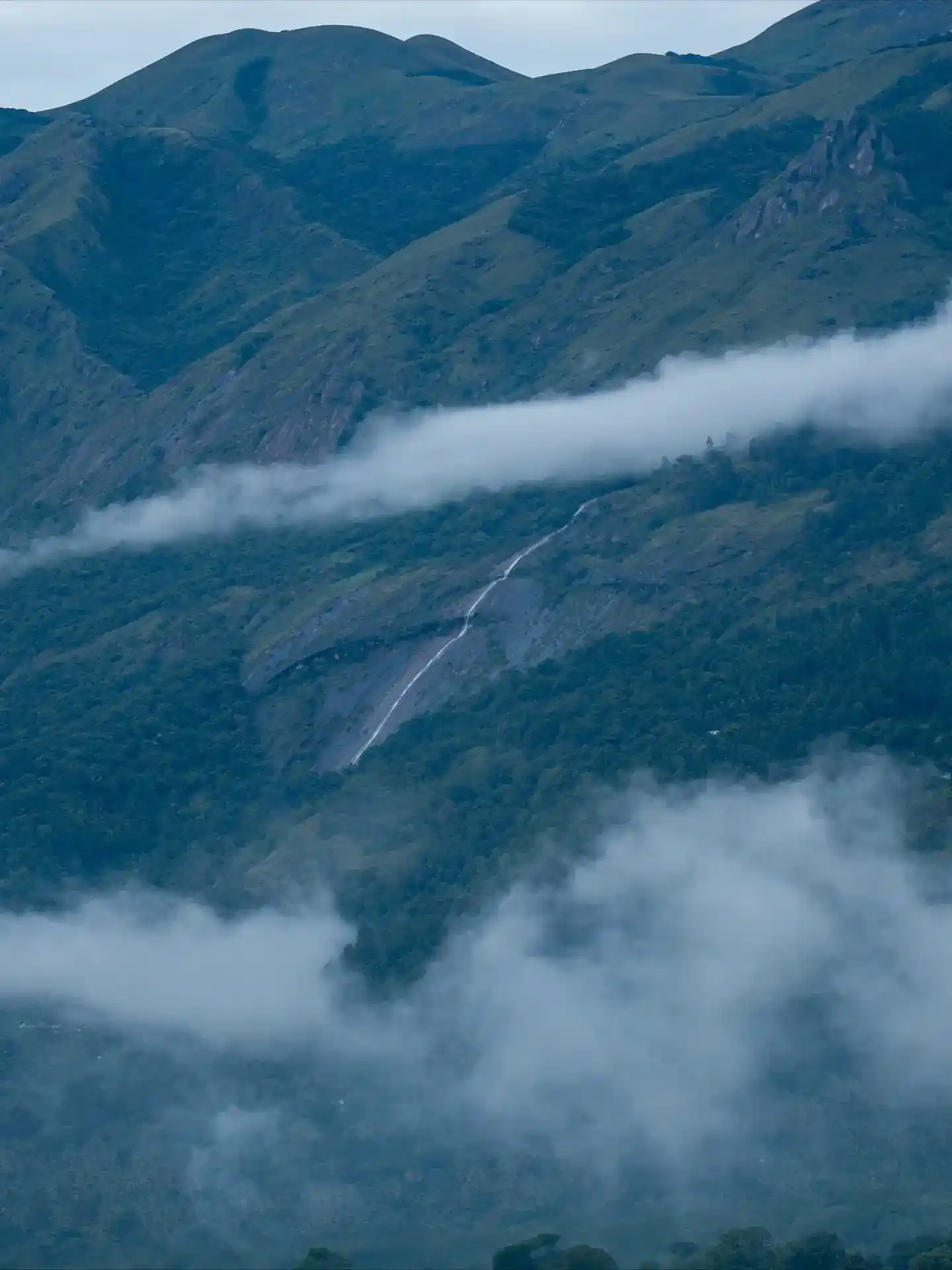 Intense white water rafting action with splashing water on Kali River, Dandeli