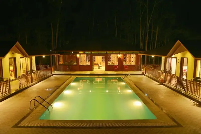 Common swimming pool area at family-friendly Dandeli resort for all ages