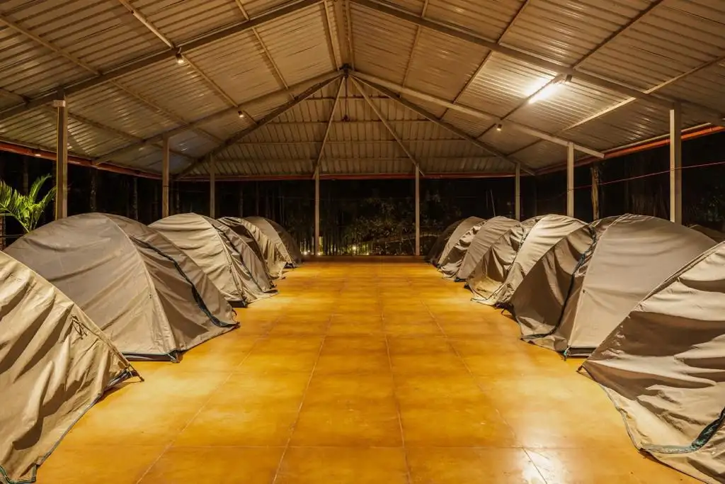 Camping tent 2-3 sharing near riverside lawns at River Edge Retreat