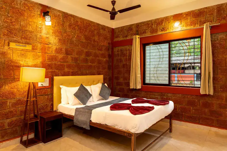 Comfortable Non-AC 2-sharing room perfect for couples at Tusker Trails